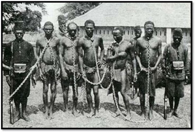 Forced labor in Congo Free State. Notice that the guards are also African